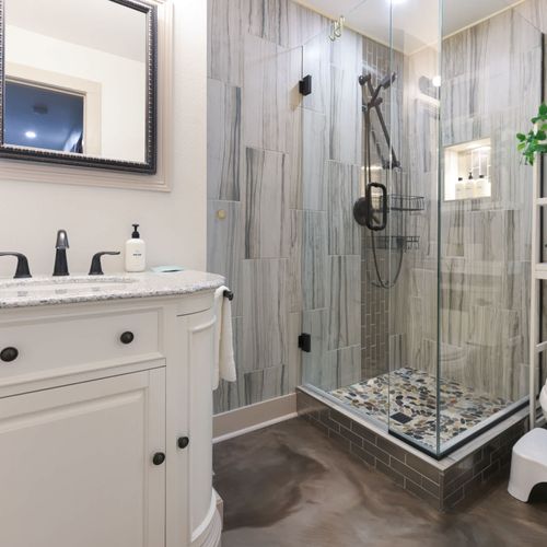 Full bathroom with walk-in glass shower