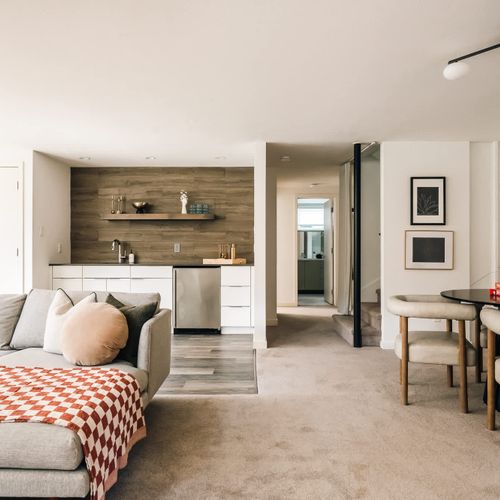 Living area with wet bar and card table