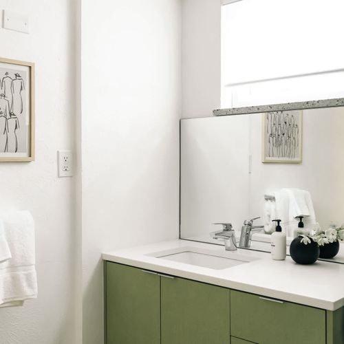 Renovated basement bathroom has retained its retro charm