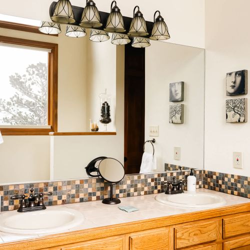 Primary bathroom with dual vanities