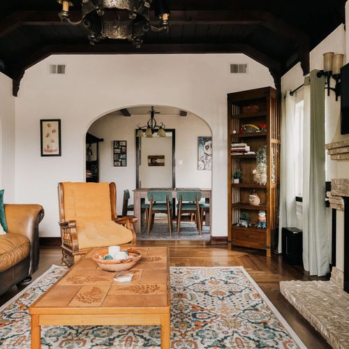 Living room with gas fireplace and TV