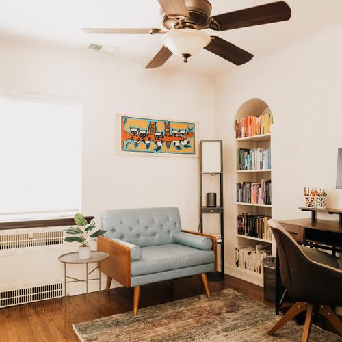 Office with desk, chair, and monitor