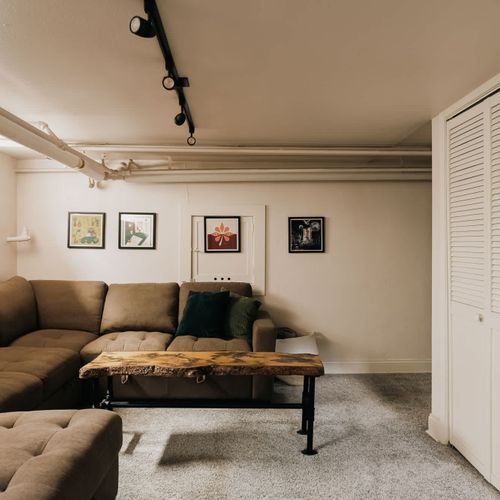 The basement sofa converts into a queen bed