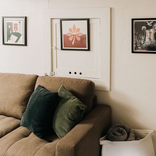 Music posters on living room walls
