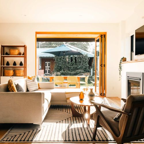 Living room connects to back patio