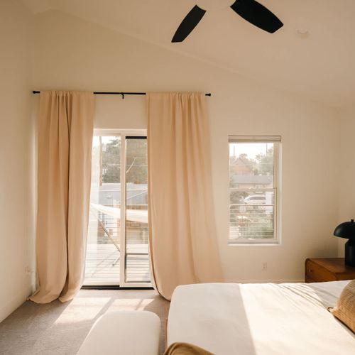 Bedroom 1 with king bed and private balcony