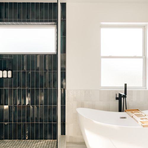 En suite bathroom to bedroom 1