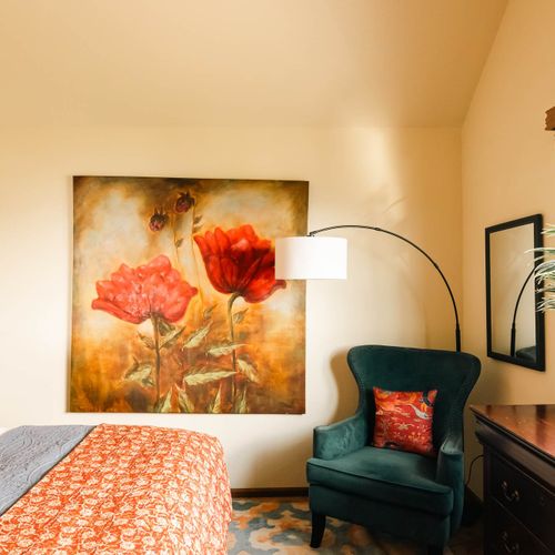 Bedroom 3 with queen bed and seating