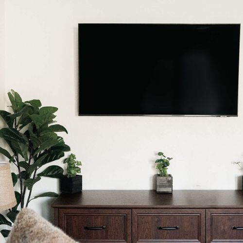 Primary bedroom with smart TV plus a full, private ensuite bathroom