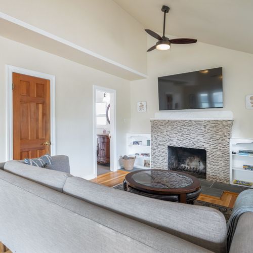 Comfortable living area with natural light and flexible seating.