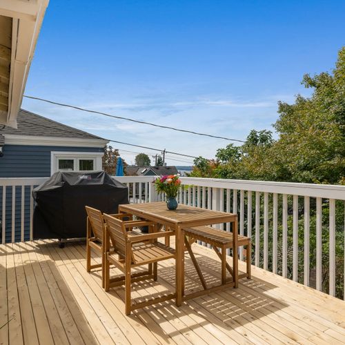 Deckside dining — seamless indoor/outdoor living.
