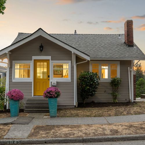 Evening curbside glow — your West Seattle retreat awaits.