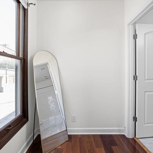 A full size mirror complete the bedroom/bathroom combination!