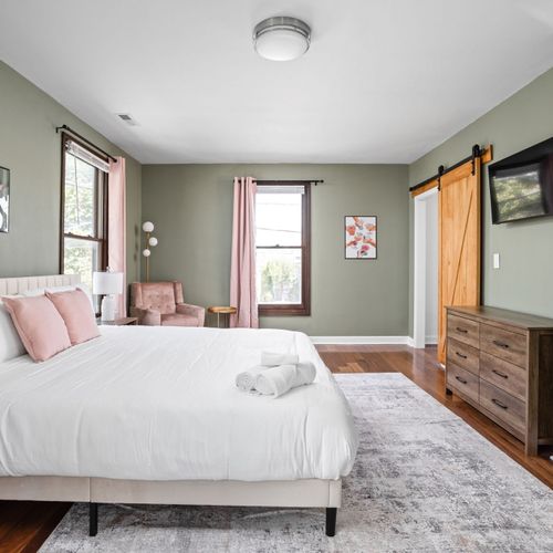 A serene green escape, softened with pretty pink touches.