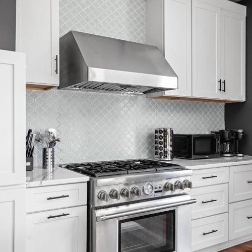 Chefs stove and oven to cook your dinner before heading out to Mass Ave.