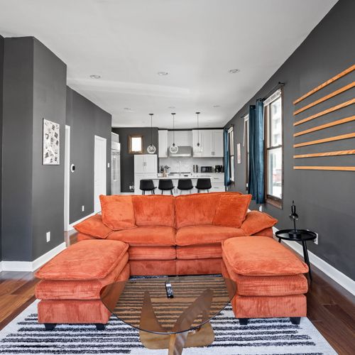 Open-concept living with bold design — lounge in style before heading out to explore Mass Ave.
