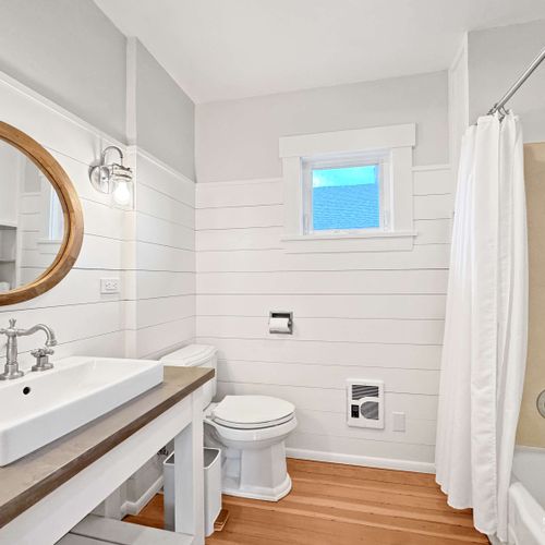 Refresh and recharge in the sparkling, well-appointed bathroom.