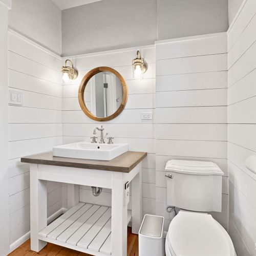 Refresh and recharge in the sparkling, well-appointed bathroom.