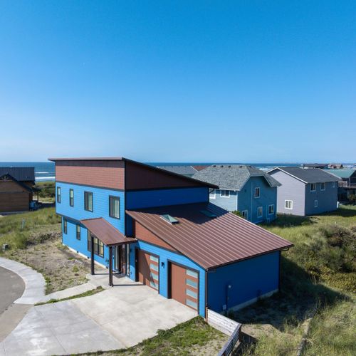 Welcome to our modern beach house with clean lines and just steps to the beach.