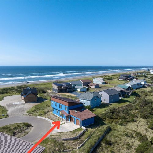 Welcome to our modern beach house with clean lines and just steps to the beach.