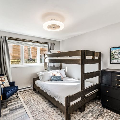 Bedroom 2 with a twin over queen bunk bed