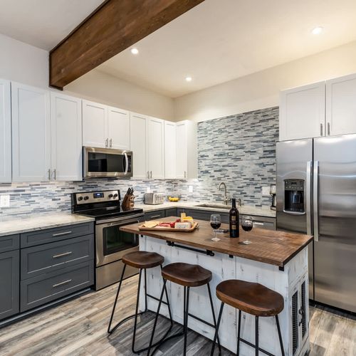Open kitchen with island bar-style seating