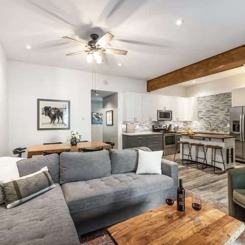 Living and dining areas with kitchen