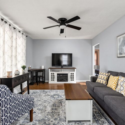 Step inside to your Broad Ripple Retreat! Cozy seating, and a Roku TV for entertainment.