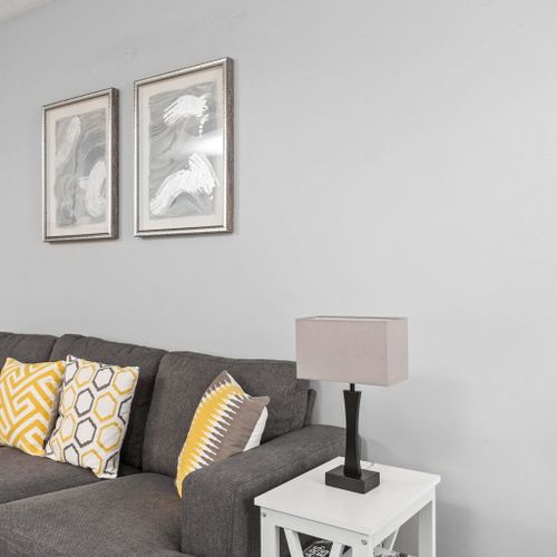 Cozy living space with modern décor and comfy seating.