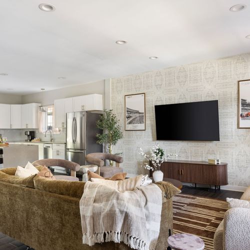 Step into our sleek and sophisticated living space with a touch of Indy flair.