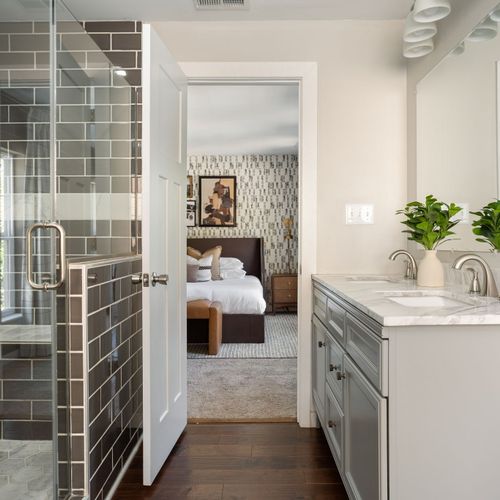 Spa-inspired ensuite with a walk-in shower and bench.