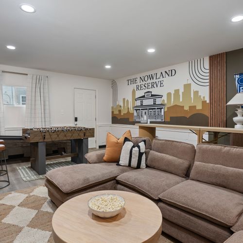 Game night or movie night? You don’t have to choose — this space does it all.