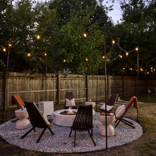 Light the fire, pour a drink, and make memories under the lights.