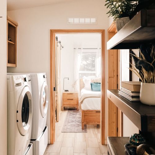 Hallway with washer and dryer