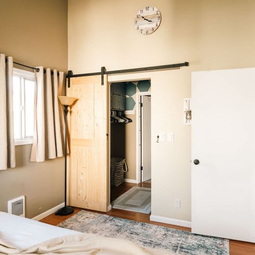 Primary bedroom with a private .75 ensuite bathroom