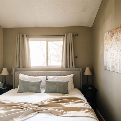 Primary bedroom with a king bed