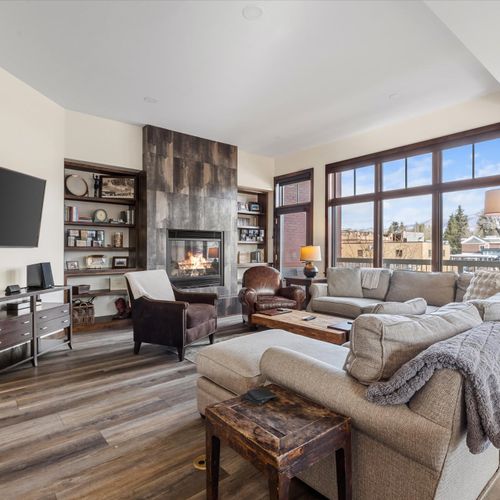 Living area with fireplace and Smart TV