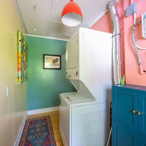 Laundry Room/Utility Room that leads to the Backyard
