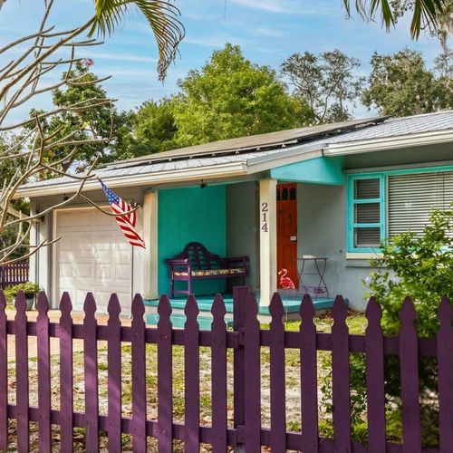 Purple Picket Fence out Front