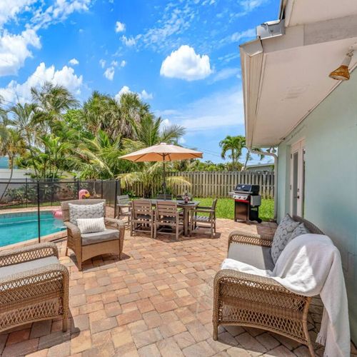 Seating around pool and backyard