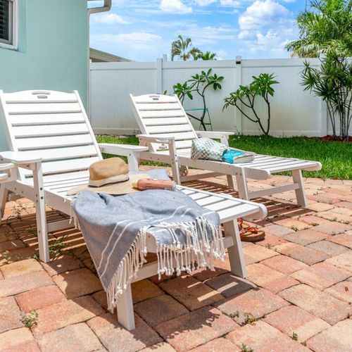 Seating around pool and backyard