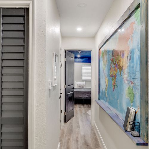 Hall coming out of Master with a view into the 2nd Bedroom down the hall
