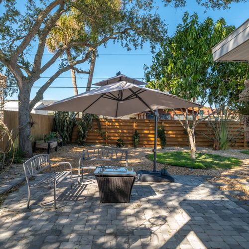 Backyard Sitting area with Umbrella