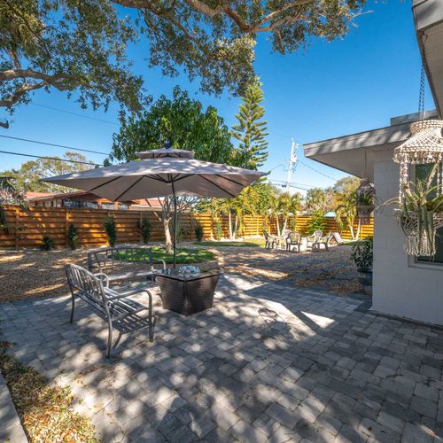 Backyard Sitting area with Umbrella