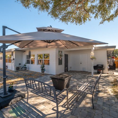 Backyard Sitting area with Umbrella