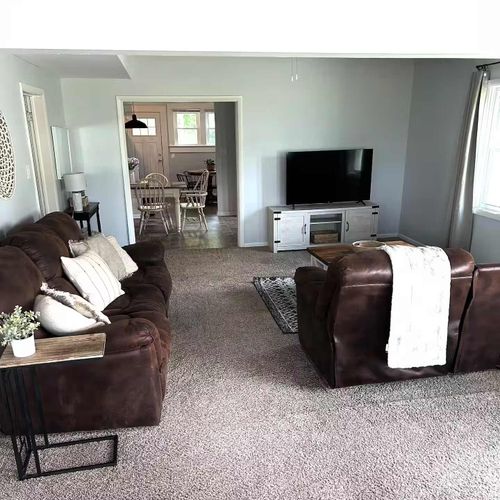 Main living area complete with cozy seating and TV!