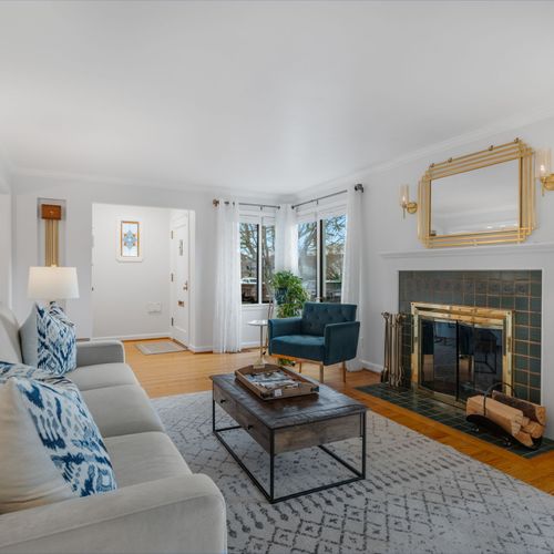 Bright and spacious living room with cozy, stylish seating.