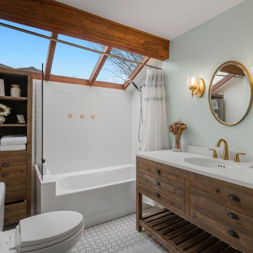 Clean, calming bath space designed for relaxation.