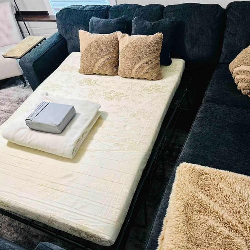 Pull out sofa located in this area as well.