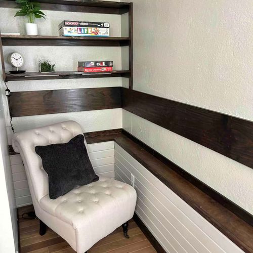 Seating area in the step down living room, with board games for the family!